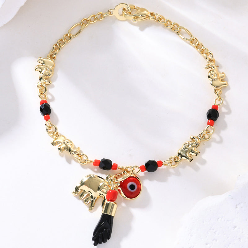 📿 50% OFF NOW! 🐘 Bohemian Evil Eye Bracelet – Elephant & Hamsa Charms – Gold-Tone & Adjustable ✨
