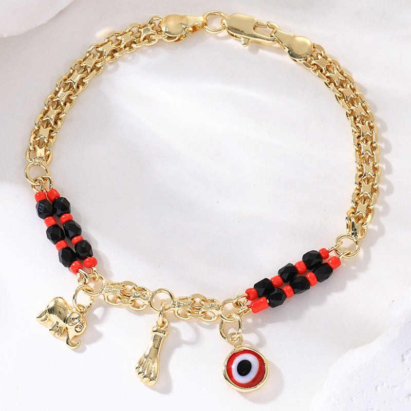 📿 50% OFF NOW! 🐘 Bohemian Evil Eye Bracelet – Elephant & Hamsa Charms – Gold-Tone & Adjustable ✨